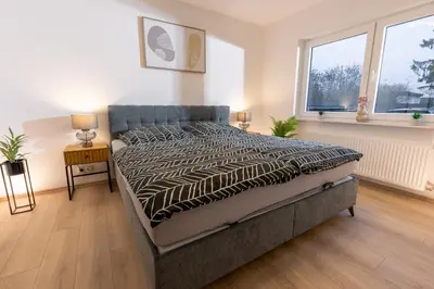 Ein Bett oder Betten in einem Zimmer der Unterkunft Eifel-Loft