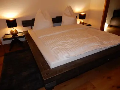 Ein Bett oder Betten in einem Zimmer der Unterkunft Geste Hoppstädten