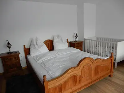 Ein Bett oder Betten in einem Zimmer der Unterkunft Geste Hoppstädten