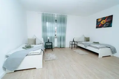 Ein Bett oder Betten in einem Zimmer der Unterkunft Eifel-Rast Mendig