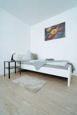 Ein Bett oder Betten in einem Zimmer der Unterkunft Eifel-Rast Mendig