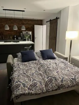 Ein Bett oder Betten in einem Zimmer der Unterkunft CityLoft Andernach