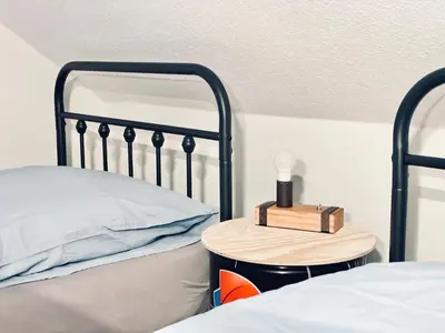 Ein Bett oder Betten in einem Zimmer der Unterkunft Ferienwohnung CURB