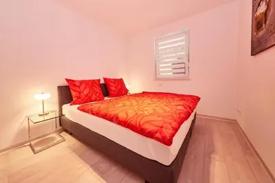 Ein Bett oder Betten in einem Zimmer der Unterkunft Ferienwohnung Moselzauber