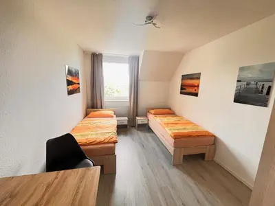 Ein Bett oder Betten in einem Zimmer der Unterkunft Monteurwohnung Natalie