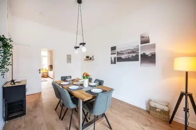 Ein Sitzbereich in der Unterkunft Südstadt Oase auf zwei Etagen 4 SZ und Balkon