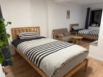 Ein Bett oder Betten in einem Zimmer der Unterkunft Ferienwohnung Neroth