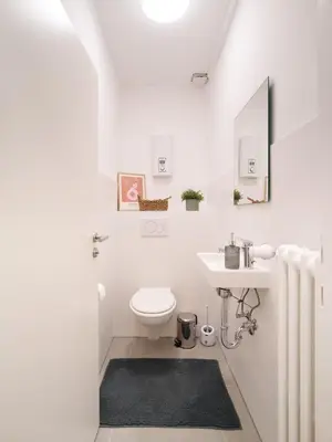 Ein Badezimmer in der Unterkunft BG Living & Hosting - Stilvolle Ferienwohnung im Zentrum von Wittlich - 2 Schlafzimmer, Netflix, Waschmaschine, bis 4 Personen