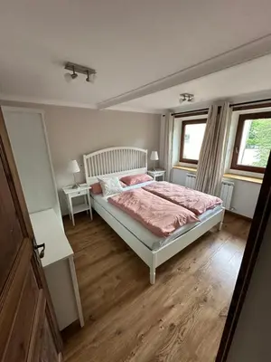 Ein Bett oder Betten in einem Zimmer der Unterkunft FeWo Moselruhe