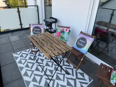 Ein Sitzbereich in der Unterkunft Zentrale Neubauwohnung mit Balkon