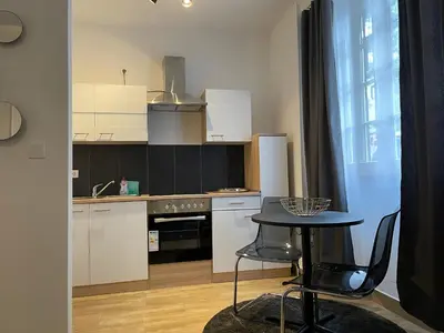 Küche/Küchenzeile in der Unterkunft City Apartments Trier Suite 3