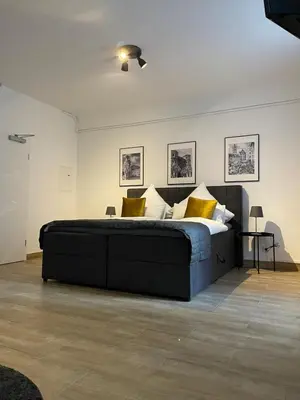 Ein Sitzbereich in der Unterkunft City Apartments Trier Suite 4