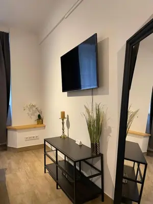 TV/Unterhaltungsangebot in der Unterkunft City Apartments Trier Suite 5