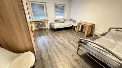 Ein Bett oder Betten in einem Zimmer der Unterkunft KomfortKoblenz WE17
