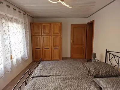 Ein Bett oder Betten in einem Zimmer der Unterkunft Zur Alten Burg