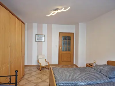Ein Bett oder Betten in einem Zimmer der Unterkunft Zur Alten Burg