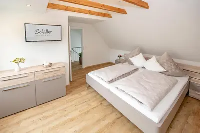 Ein Bett oder Betten in einem Zimmer der Unterkunft Haus Schüller