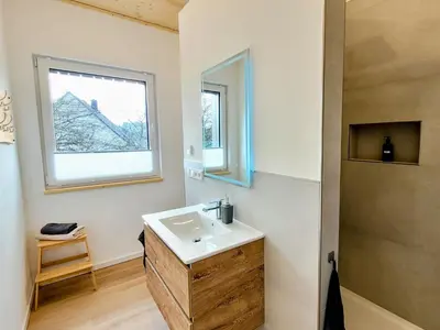 Ein Badezimmer in der Unterkunft Ferienwohnung Traumpanorama im HerberHaus Hunsrück