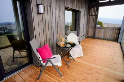 Ein Balkon oder eine Terrasse in der Unterkunft Ferienwohnung Traumpanorama im HerberHaus Hunsrück