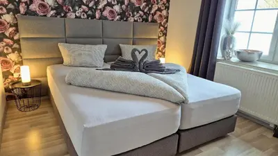 Ein Bett oder Betten in einem Zimmer der Unterkunft Eifelauszeit - Wohnung Klein