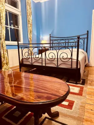 Ein Bett oder Betten in einem Zimmer der Unterkunft Appartement Rheinfelsblick - Historische Eleganz und moderner Komfort
