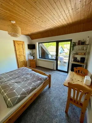 Ein Bett oder Betten in einem Zimmer der Unterkunft Haus Mindermann