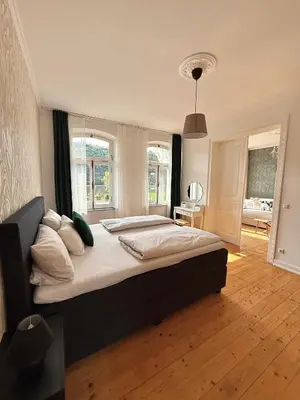 Ein Bett oder Betten in einem Zimmer der Unterkunft Villa Rheinblick 1 OG