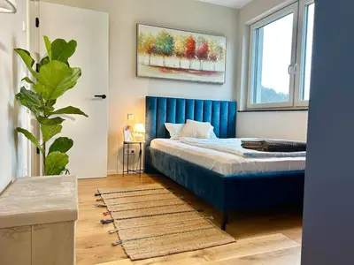 Ein Bett oder Betten in einem Zimmer der Unterkunft Ron vacation home in Gerolstein