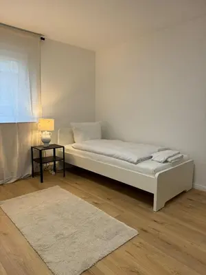 Ein Bett oder Betten in einem Zimmer der Unterkunft WW02 - Businessapartment Koblenz