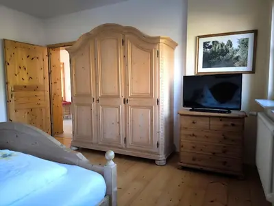 Ein Bett oder Betten in einem Zimmer der Unterkunft Ferienwohnungen Haus Marianne