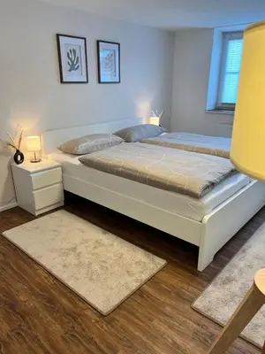 Ein Bett oder Betten in einem Zimmer der Unterkunft Wohlfühl Appartment - Wohnen auf Zeit - Netflix