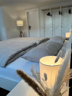 Ein Bett oder Betten in einem Zimmer der Unterkunft Wohlfühl Appartment - Wohnen auf Zeit - Netflix