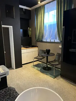 Ein Sitzbereich in der Unterkunft City Apartments Trier-Karl-Marx Suite 1