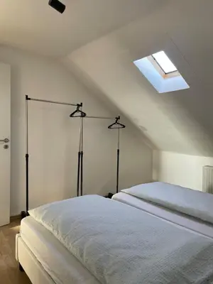 Ein Bett oder Betten in einem Zimmer der Unterkunft Ferienhaus - Eifeltraum - Salm