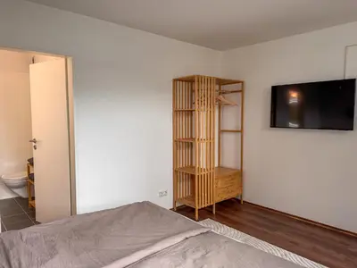 Ein Bett oder Betten in einem Zimmer der Unterkunft TRIMOSA - Apartments & Homes