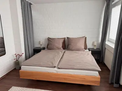 Ein Bett oder Betten in einem Zimmer der Unterkunft TRIMOSA - Apartments & Homes