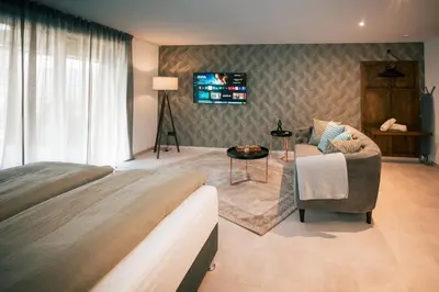 Ein Bett oder Betten in einem Zimmer der Unterkunft Cozy Koori 1770- Villa Rizas Hills
