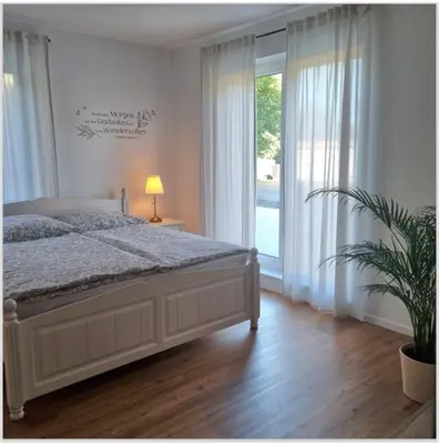 Ein Bett oder Betten in einem Zimmer der Unterkunft Auszeit in der Vulkaneifel