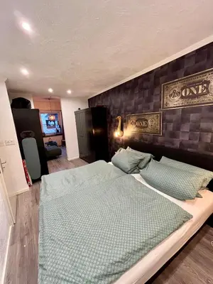 Ein Bett oder Betten in einem Zimmer der Unterkunft Meyver Ferienwohnung