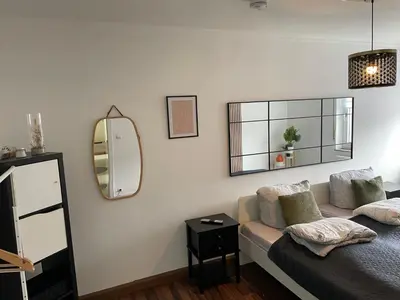 Ein Bett oder Betten in einem Zimmer der Unterkunft Schöne Wohnung in ruhiger Lage