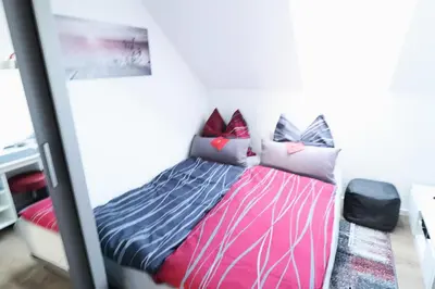 Ein Bett oder Betten in einem Zimmer der Unterkunft Loreley Hills Residence 3