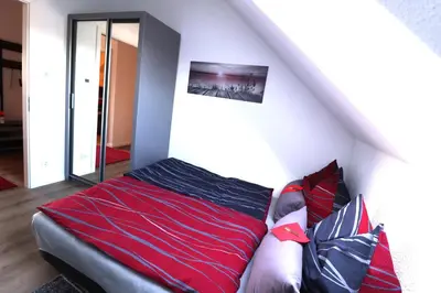 Ein Bett oder Betten in einem Zimmer der Unterkunft Loreley Hills Residence 3