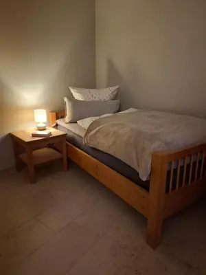 Ein Bett oder Betten in einem Zimmer der Unterkunft Ferien-Appartement