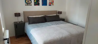 Ein Bett oder Betten in einem Zimmer der Unterkunft Denkmalgeschütztes Ferienhaus in der Südeifel - Ferienhaus HAZEN