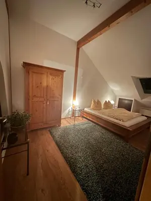 Ein Bett oder Betten in einem Zimmer der Unterkunft Ferienwohnung LESOM
