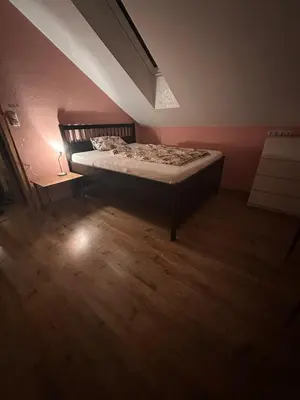 Ein Bett oder Betten in einem Zimmer der Unterkunft Ferienwohnung LESOM