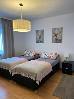 Ein Bett oder Betten in einem Zimmer der Unterkunft Ferienhaus mit Balkon Koblenz am Rhein