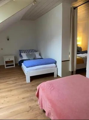 Ein Bett oder Betten in einem Zimmer der Unterkunft Ferienhaus mit Balkon Koblenz am Rhein