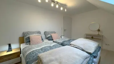 Ein Bett oder Betten in einem Zimmer der Unterkunft Ganzes Haus in Innenstadt für 3 Küche Terrasse