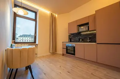 Küche/Küchenzeile in der Unterkunft LLR Design Apartment - Orange Mandarine im Zentrum von Koblenz